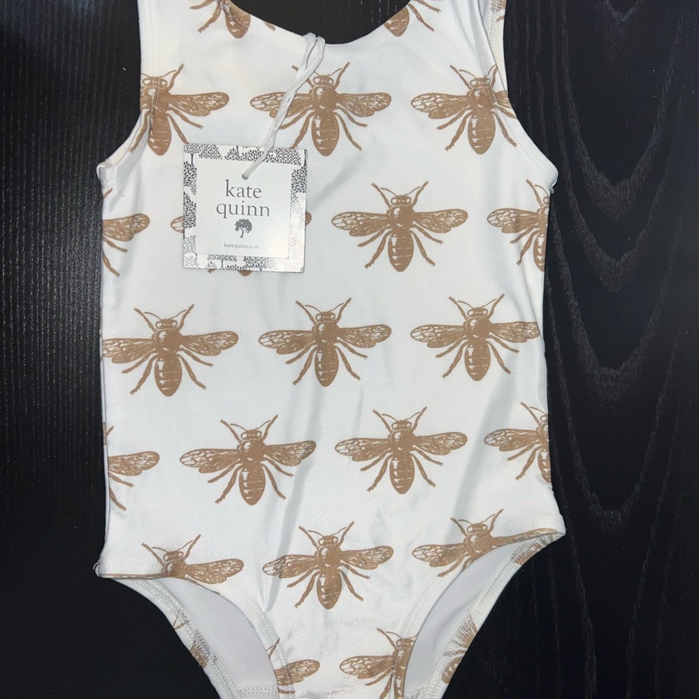 Kate Quinn (2021)  Kids Swim Bodysuit - White and Brown Bee Print